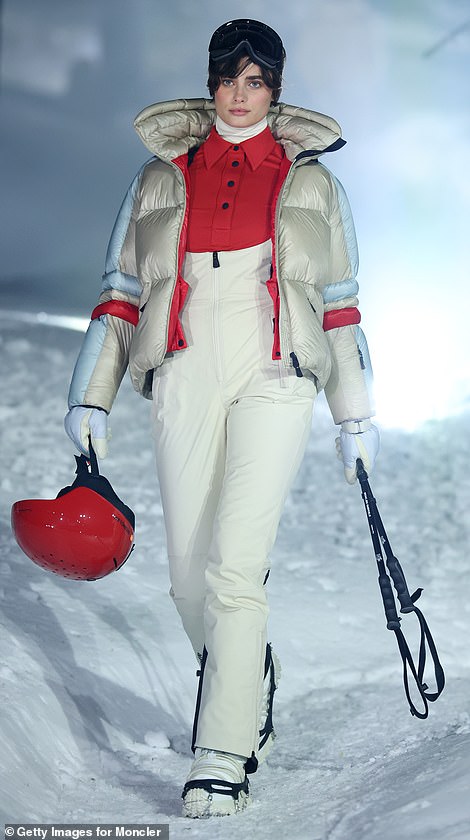 Taylor Marie Hill was wearing a red ski helmet on the right