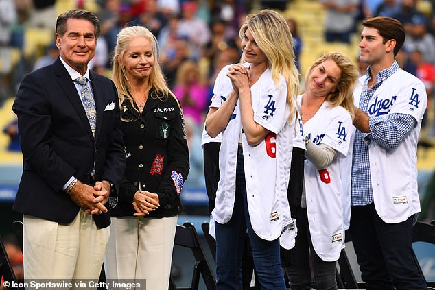 Former Dodger Steve Garvey stands with his wife Candace and several of his children during a ceremony in his honor before an MLB game between the Philadelphia Phillies and the Los Angeles Dodgers on June 1, 2019