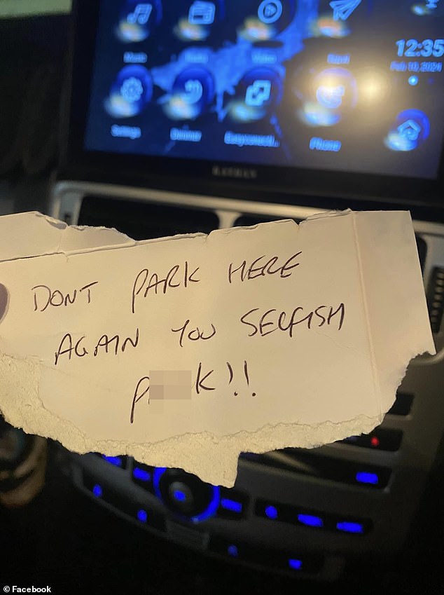 A dad was left shocked and angry after an insulting note with profanity (pictured) was left on his car as he parked in a spot reserved for parents