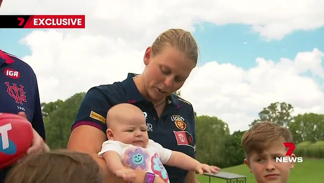 Brisbane Lions star Kate Lutkins has opened up about juggling motherhood and the rigors of being an athlete