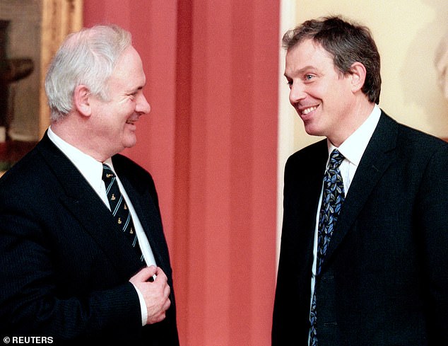 After losing the 1997 election, Mr Bruton remained leader of Fine Gael for four more years and remained involved in efforts to reach a peace deal (pictured with Tony Blair in 1998)