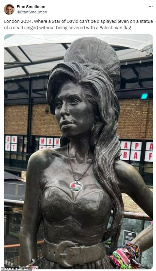 A Palestinian flag was stuck on Amy Winehouse's memorial statue in Camden Town by protesters this weekend.  The sticker was placed on her Star of David necklace