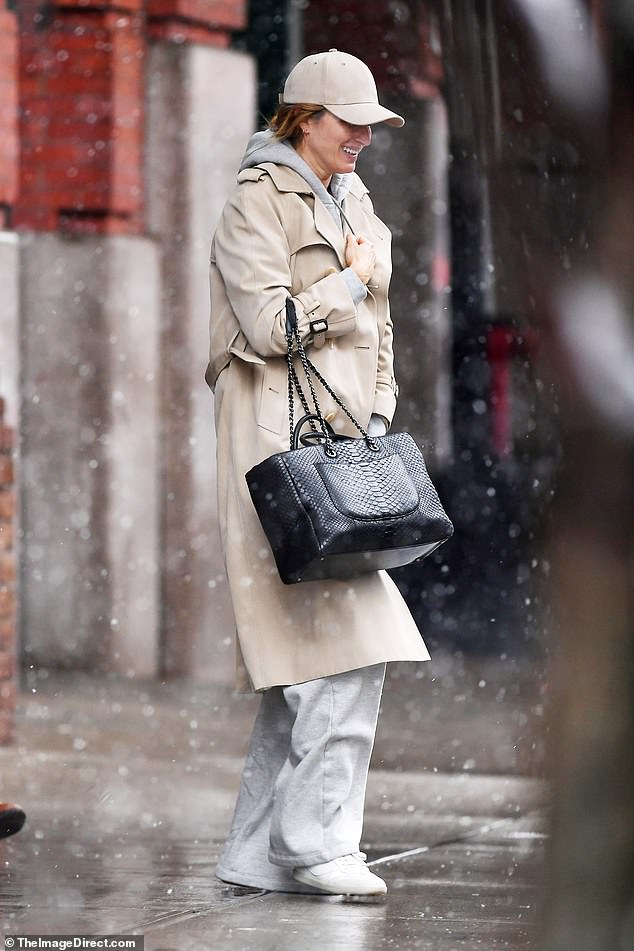 Gisele Bundchen bundled up Tuesday morning as she stepped out amid a snowstorm in New York City