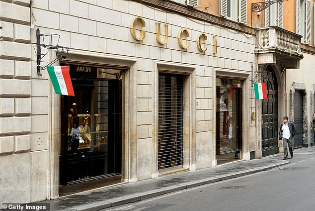 Gucci's turnover fell by 4 percent in the last three months of the year, parent company Kering reported on Thursday.  Pictured is a Gucci store in Rome