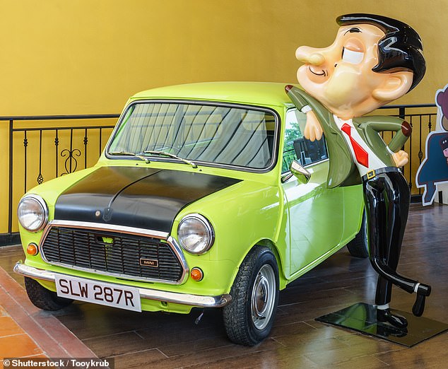 Car-nage: Mr Bean star Rowan Atkinson accused of damaging the take-up of electric cars by writing a newspaper article saying they were boring