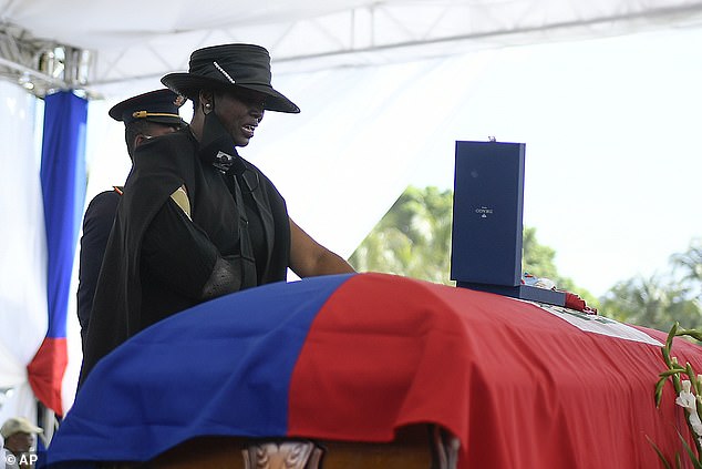 Former Haitian First Lady Martine Moise (pictured at her husband's funeral in 2021) is accused of complicity in the murder, which she denies