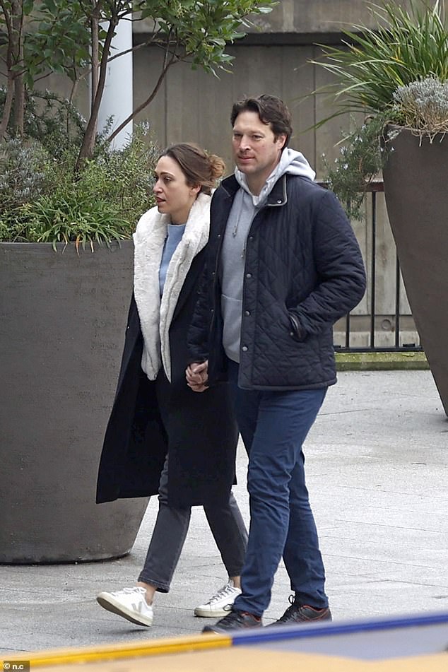 The King's equerry, Lieutenant Colonel Johnny Thompson, was seen dressed in a hoodie and trainers - strolling down a London street with his new love Olivia Lewis