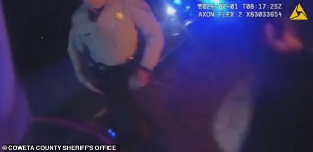 Two members of a west Georgia sheriff's office rescued a man from his burning car after 3 a.m. last Thursday