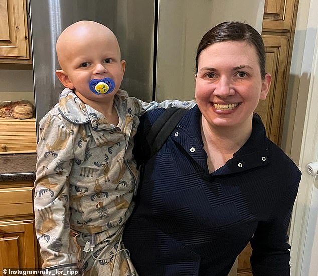 Jorilynn holds her son Ripplen in their Utah home as the couple smiles and the adorable four-year-old wraps one of his arms around his mother