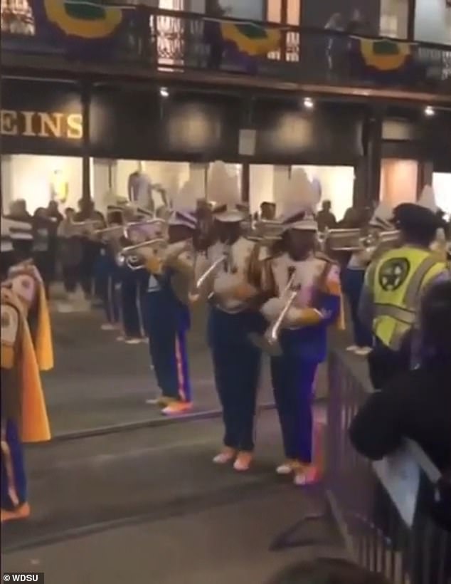 Brandon Mitchell, a student at a local charter school, marched with the LB Landry High School band during the Krewe of Muses parade - one of the largest of the season - Thursday evening