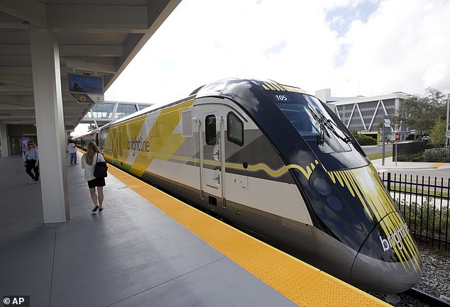 A proposed high-speed passenger train linking Las Vegas to LA has been given new impetus with the approval of $2.5 billion (£1.975 billion) in additional funding.  The Brightline West railroad aims to transport passengers across the Nevada desert in just two hours.  Pictured is a Brightline train in Fort Lauderdale