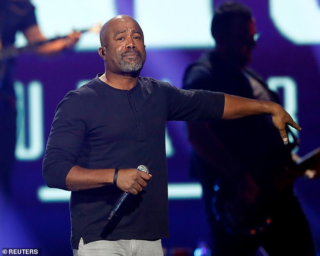 Hootie & the Blowfish singer Darius Rucker was arrested Thursday on drug charges in Tennessee, TMZ reported Thursday.  Pictured on stage in Las Vegas in September 2021