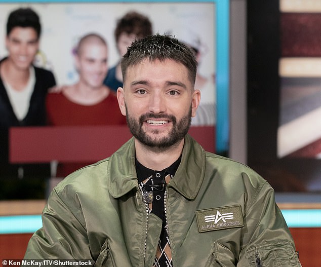 The Wanted star Tom Parker died in March 2022 after a year-and-a-half battle with stage four glioblastoma brain cancer, aged just 33 (pictured in December 2021)