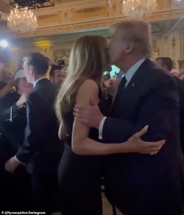 Donald Trump kisses wife Melania Trump during the Trumpette Gala at Mar-a-Lago