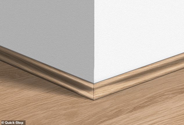 The photo above shows the laminate flooring and then Scotia where it meets the baseboard.  Most good laminate floors can be chosen with a slim scotia to match the wood design