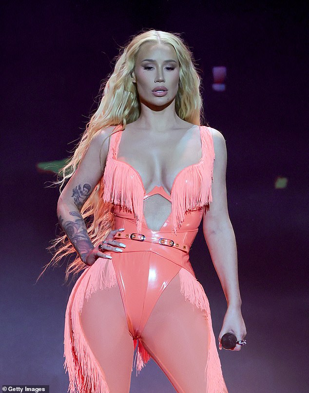 Iggy Azalea, 33, (pictured) took outrageous swipe at estranged baby daddy Playboi Carti after blasting his parenting skills