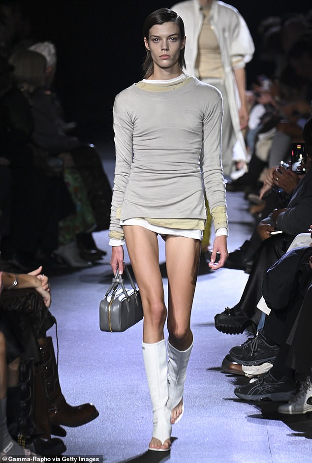 A model walks the catwalk during the Miu Miu Ready to Wear Spring/Summer 2023 fashion show as part of Paris Fashion Week