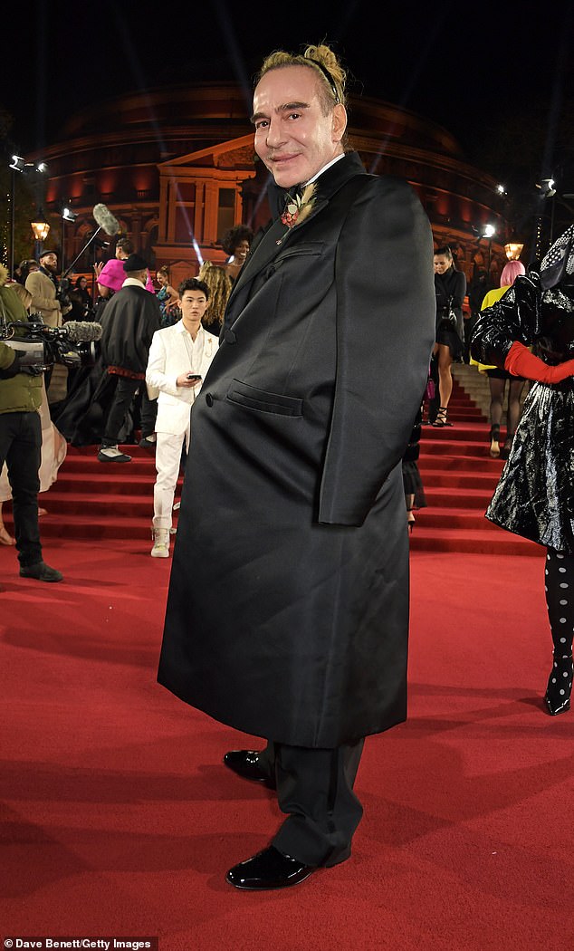 John Galliano, pictured arriving at the 2021 Fashion Awards at the Royal Albert Hall, was responsible for putting Kate Moss on the map but also strangely threw a dead dish at the crowd at LFW 1984