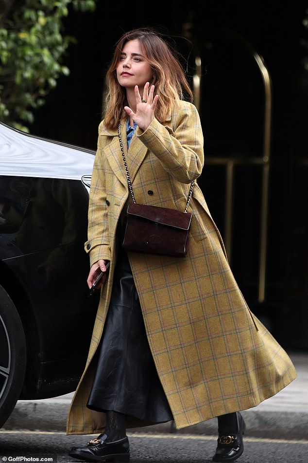 Jenna Coleman appears to quash rumors she's tying the knot after sliding her so-called 'wedding ring' to her middle finger