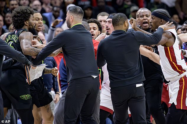 Naji Marshall (L) and Jimmy Butler (R) had to be separated during a second-half scuffle on Friday