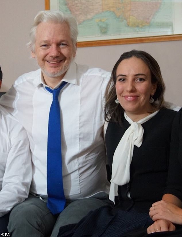 Julian Assange, who is accused of espionage and faces up to 175 years in prison, pictured with his wife Stella