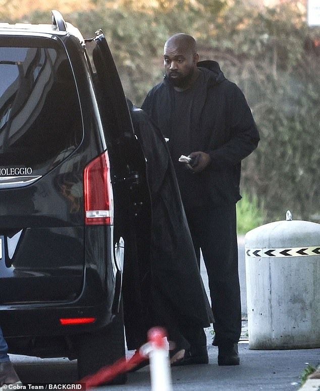 Apple Music quickly scooped up Kanye West's Vulture 1 album just five days after its debut on the platform on Thursday;  Kanye pictured in Italy on Wednesday