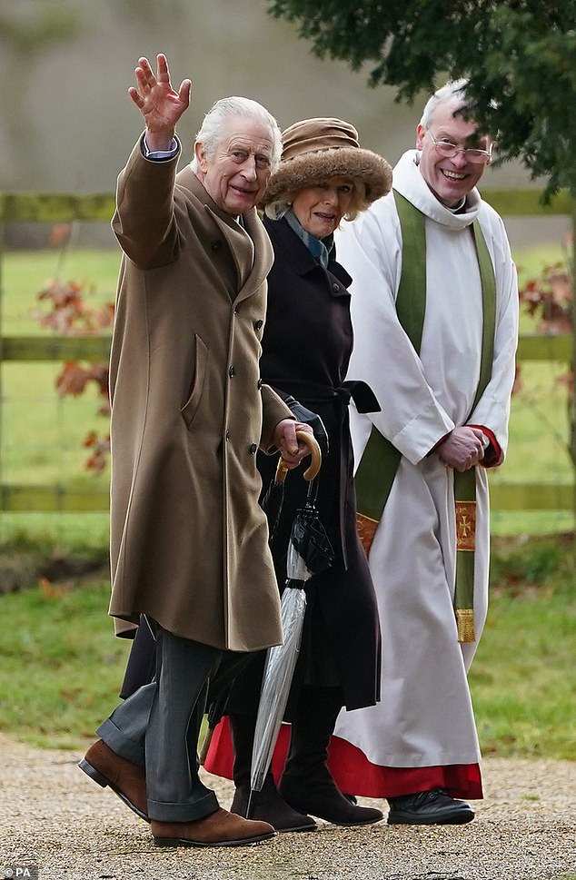 The 74-year-old monarch waved to his well-wishers as he strolled through the Norfolk estate and appeared in good spirits after his hospital stay