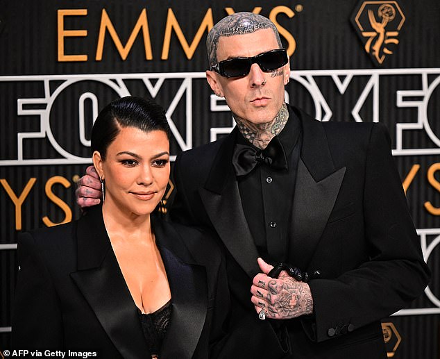 Kourtney Kardashian and Travis Barker are reportedly in talks to find a surrogate mother for baby number two