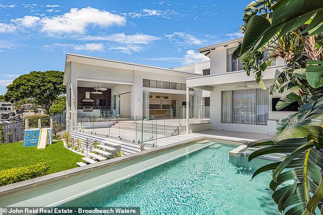 The glamorous former Gold Coast home of fitness influencer Ashy Bines has gone under the hammer for $4.3 million - twice what she sold it for four years ago.  (Pictured)