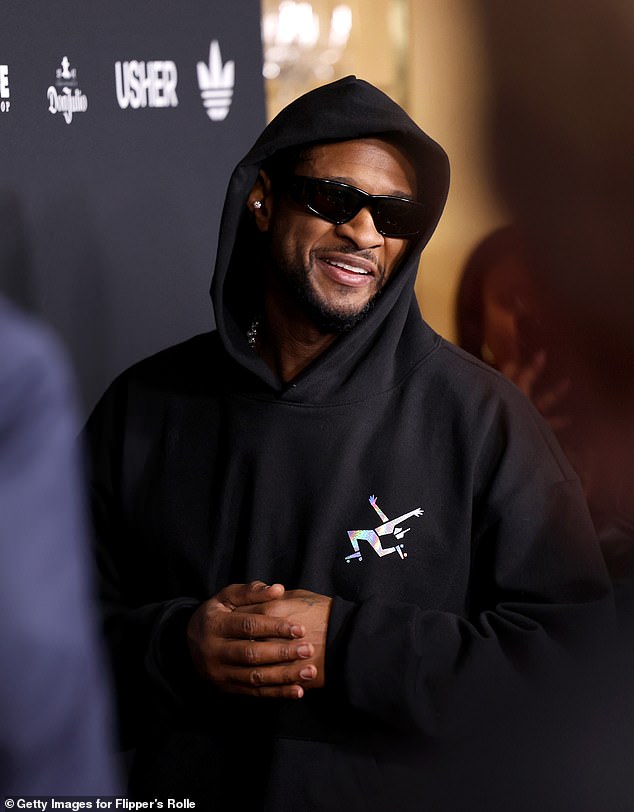 Following his incredible halftime performance, Usher arrived at the star-studded event in a black tracksuit