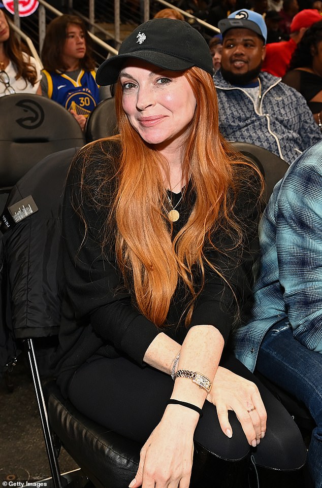Lindsay Lohan attended the Atlanta Hawks game against Golden State Warriors in Atlanta, Georgia on Saturday