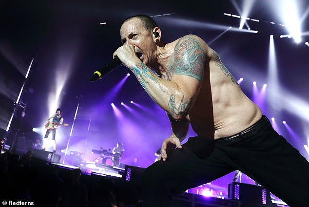 Late singer Chester Bennington can be heard on lead vocals on the previously unheard song Friendly Fire, released Friday, ahead of Linkin Park's greatest hits album Papercuts;  he is seen in 2017