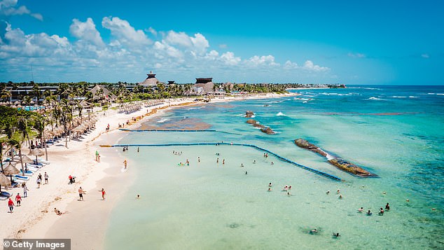 Pictured: Coba Beach in Quintana Roo, Mexico.  The woman, identified as Niko Honarbakhsh, was shot dead during the ordeal - and prosecutors in Quintana Roo insisted she was not linked to the drug deal.  The deceased had been at a beach club in the Tulum Hotel Zone, a coastal tourist strip full of luxury clubs and eateries