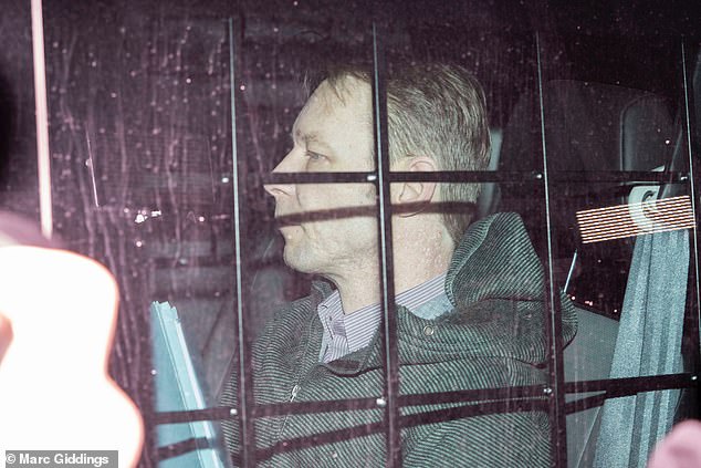 Christian Brueckner was pictured pulling up in a prison van outside the courtroom in Brunswick, Lower Saxony