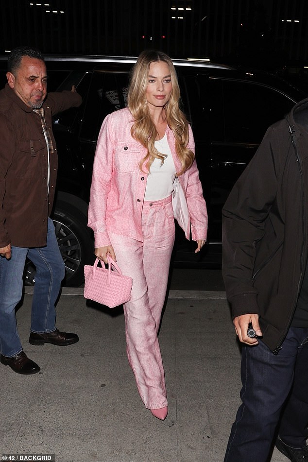 Margot Robbie opted for a pink look on Tuesday as she attended a special Barbie screening at the Writers Guild in Beverly Hills