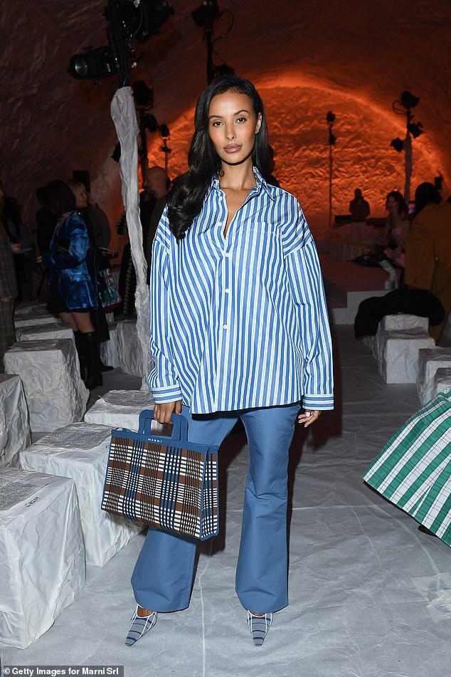 Maya Jama put on a chic look in an oversized shirt as she attended the Marni show during Milan Fashion Week on Friday