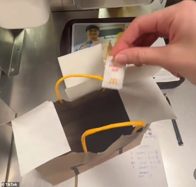 A TikTok user, Paige, posted a video of herself packing a single salt packet into a delivery bag at McDonald's.  It is unclear where exactly this happened