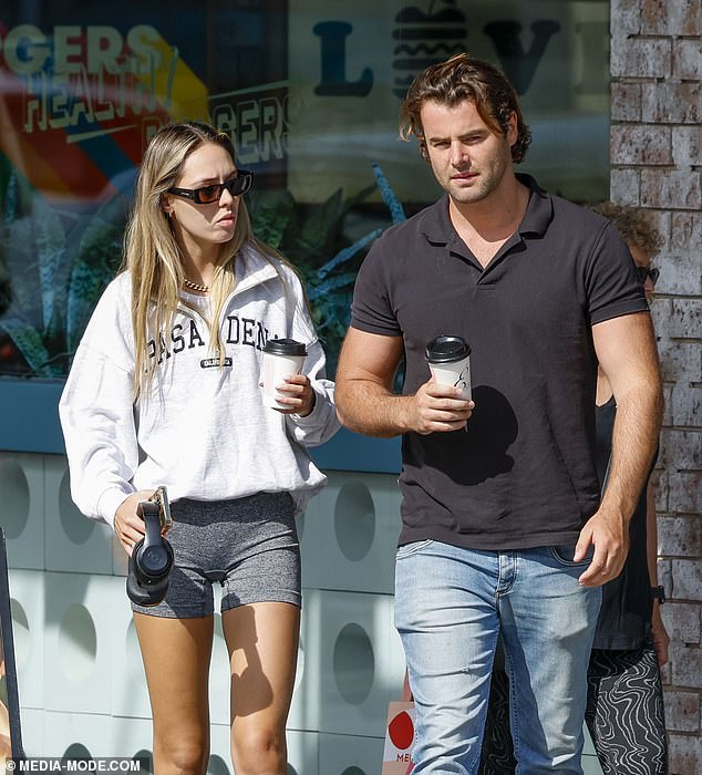 Mia Fevola and her boyfriend Bass Miller looked dejected as they stepped out for coffee in Melbourne on Tuesday