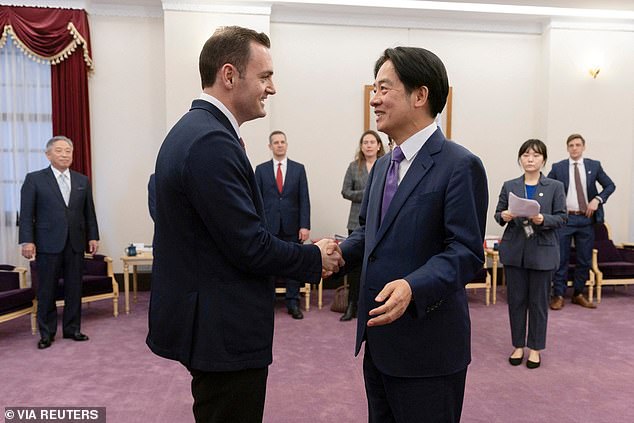 Mike Gallagher and new Taiwanese President Lai Ching-te shake hands