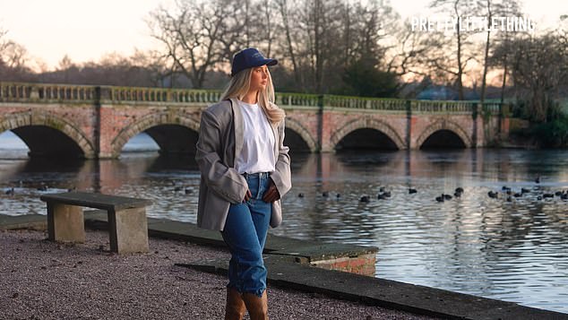 The blonde beauty later donned an oversized gray blazer, which she paired with a casual white T-shirt, bright blue jeans and brown cowboy boots.