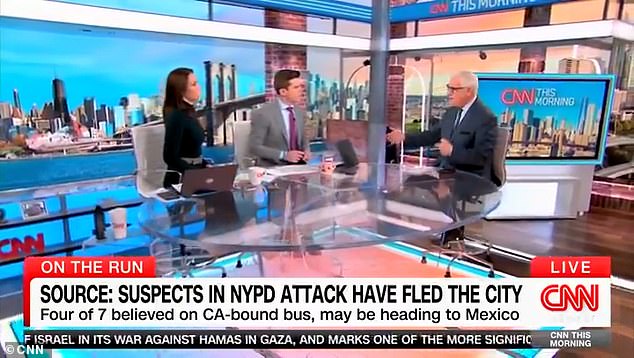 The CNN panel on Saturday discussed the brutal attack on two police officers in Times Square, and the disappearance of the migrants who were arrested after being released without bail.