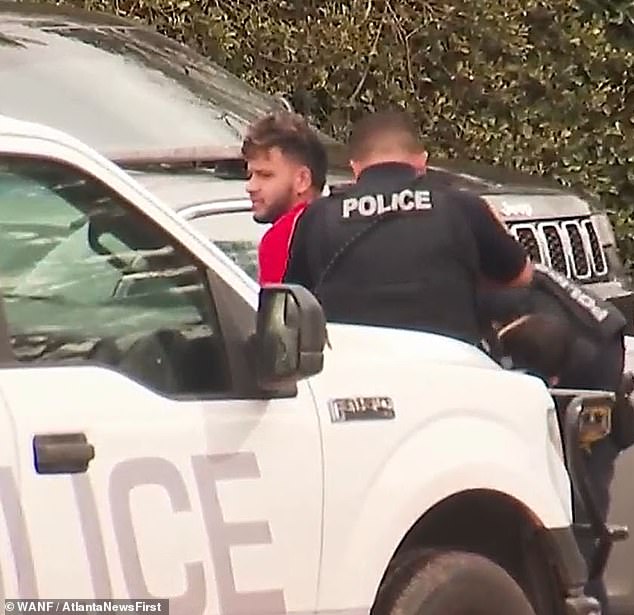 Moment Georgia nursing students killer is pinned against cop car