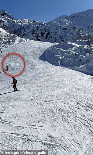 The plane dropped its payload before the gas cylinder hit the ground in a puff of snow and then hurtled down the slopes, dangerously close to skiers descending the mountain.