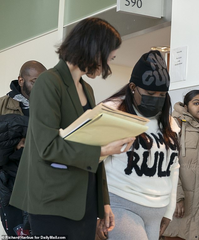 Tajahnae Brown, 23, of the Bronx, is accused of poisoning her child and making 190 trips to the hospital to seek unnecessary medication.  The flashy 'no more rules!'  sweater she wore at her hearing cost $12.49 at Shein, and she paired it with her “mea culpa” hat, which retails for $8 on Amazon