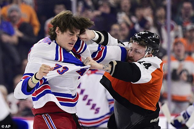 Flyers' Nicolas Deslauriers (44) and Rangers' Matt Rempe (73) brawl during the first period