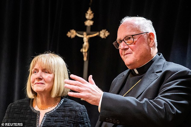 Archbishop of New York Cardinal Timothy Dolan (right) denounced the 