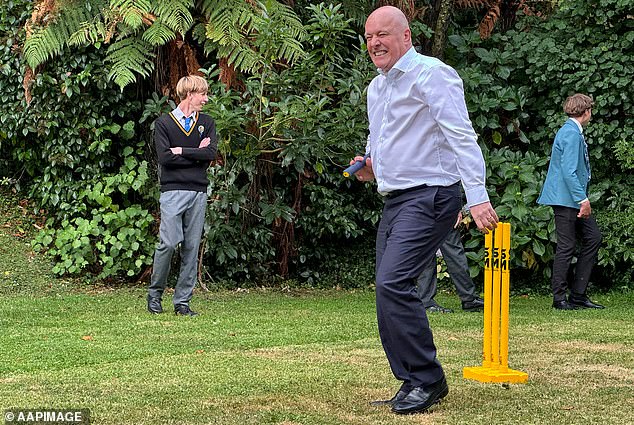 The Prime Minister (pictured playing backyard cricket at his official residence) disputed Khawaja's account, saying he had never used the word 'convicted'.