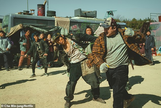 Heo Myeong Haeng's directorial debut follows a fearless hunter, Nam San (Ma), who turns to heroism after an earthquake turns Seoul into a lawless badland (pictured with Don Lee)