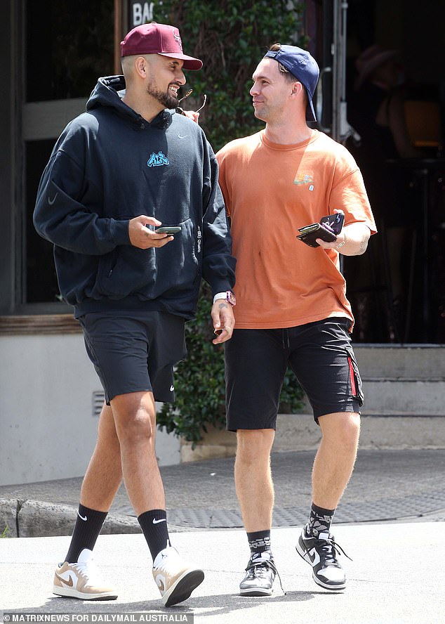 Nick Kyrgios appeared in good spirits as he headed out for a lunch date with a friend on Saturday.  Pictured