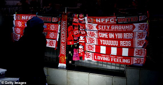 NOTTINGHAM, ENGLAND - FEBRUARY 28: A general view of merchandise from street vendors, such as half and half scarves featuring Manchester United and Nottingham Forest and scarves showing support for Nottingham Forest, are on display, ahead of the Emirates FA Cup fifth round match between Nottingham Forest and Manchester United at the City Ground on February 28, 2024 in Nottingham, England.  (Photo by Catherine Ivill/Getty Images)